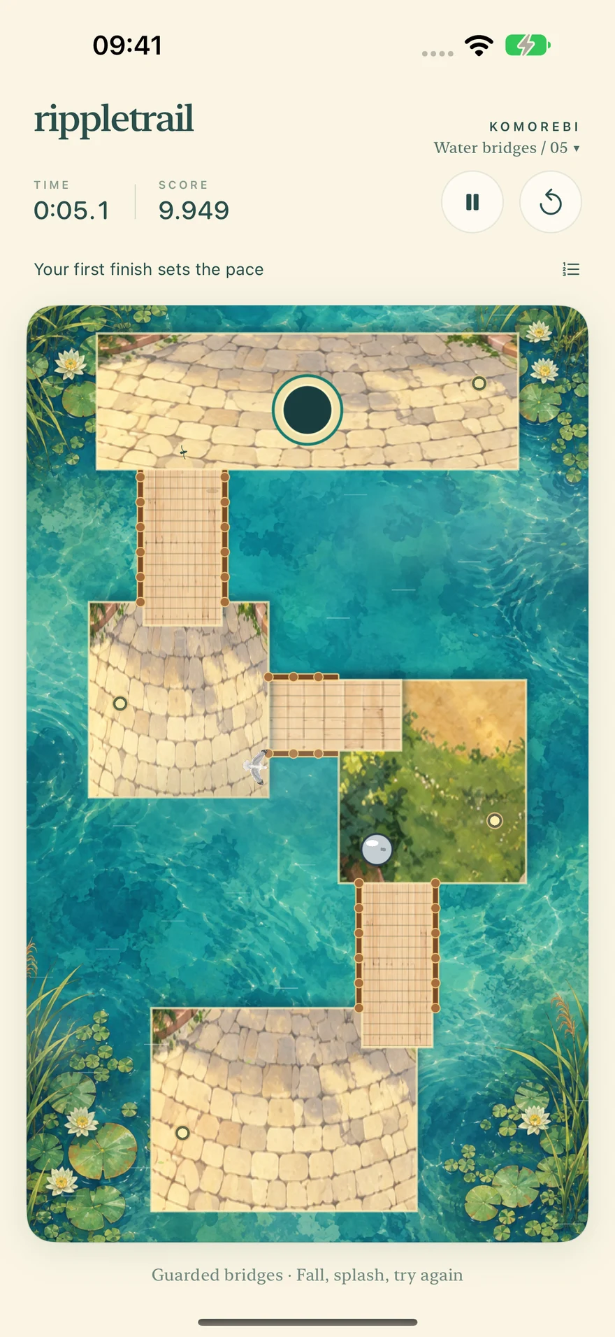 Timber bridges joining small islands surrounded by blue water.