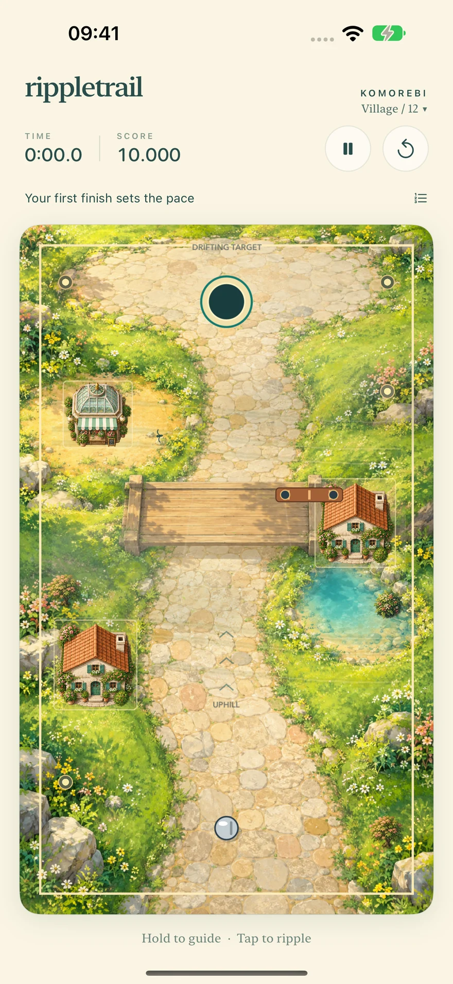 A village course with cottages, cobblestones and a timber crossing.